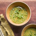 Rustic watercress soup with carrots and ramp leaves