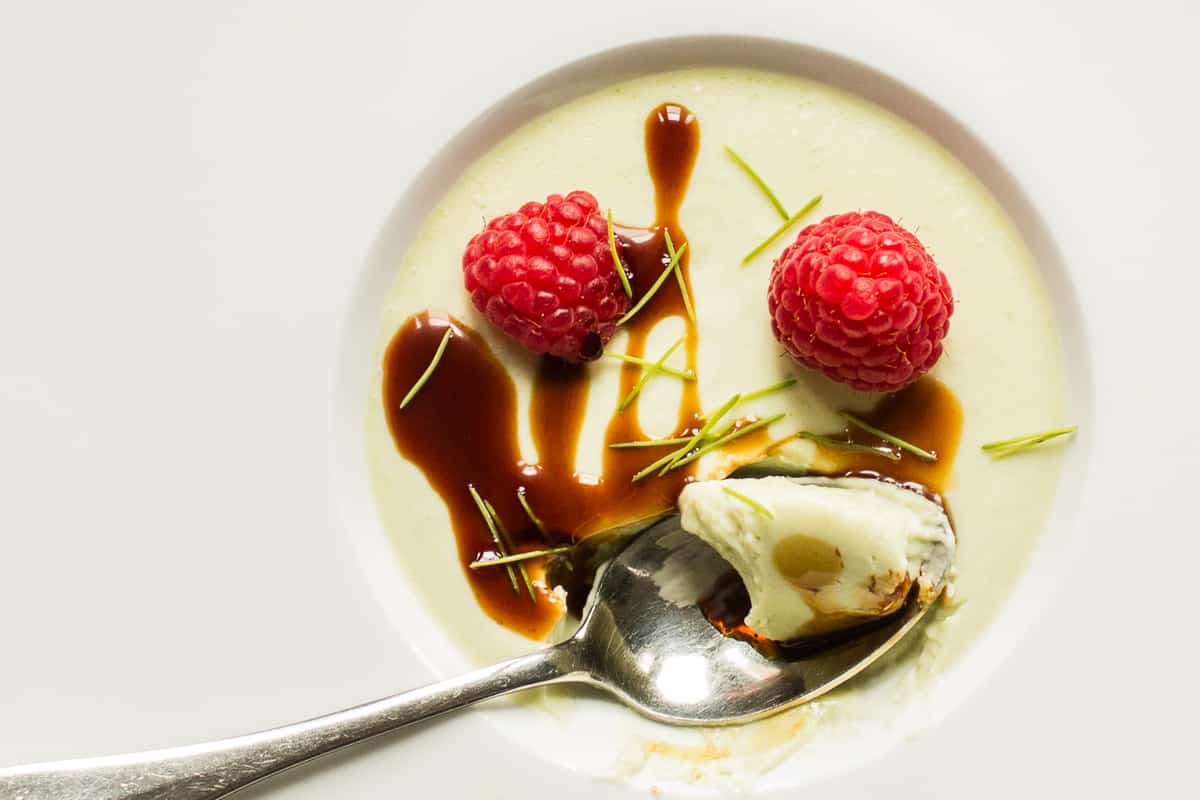 Spruce tip panna cotta recipe with aged balsamic and raspberries