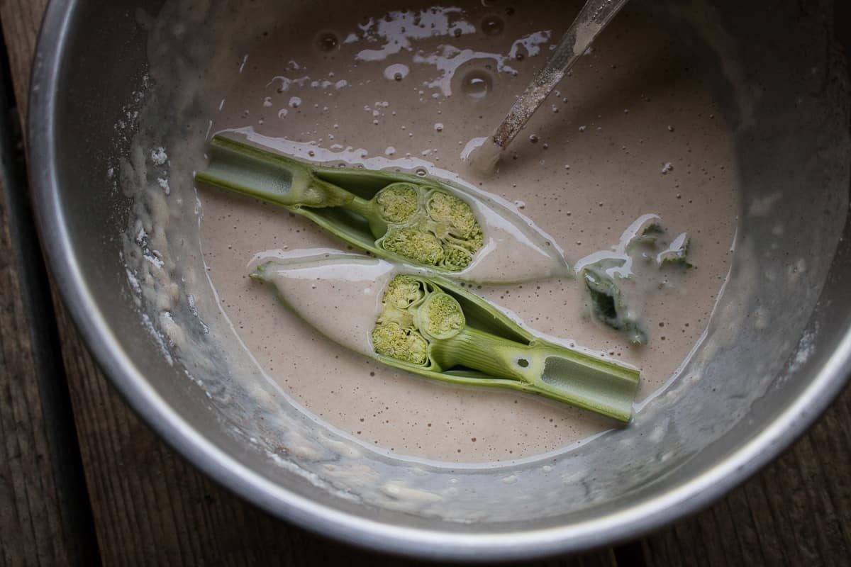 Zavirne or angelica blossoms being battered and fried