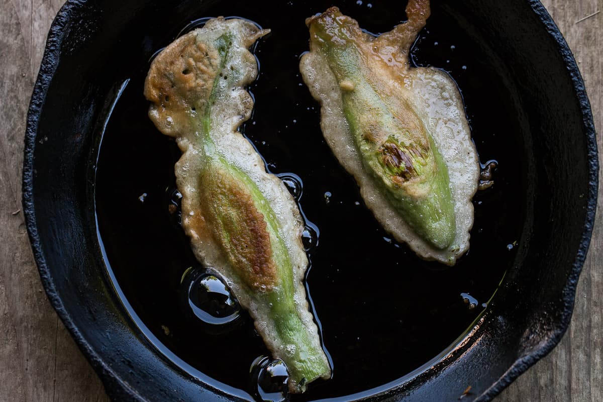 Zavirne or angelica blossoms being battered and fried