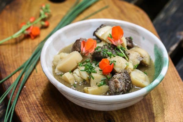 Buffalo stew with ramps and hominy 