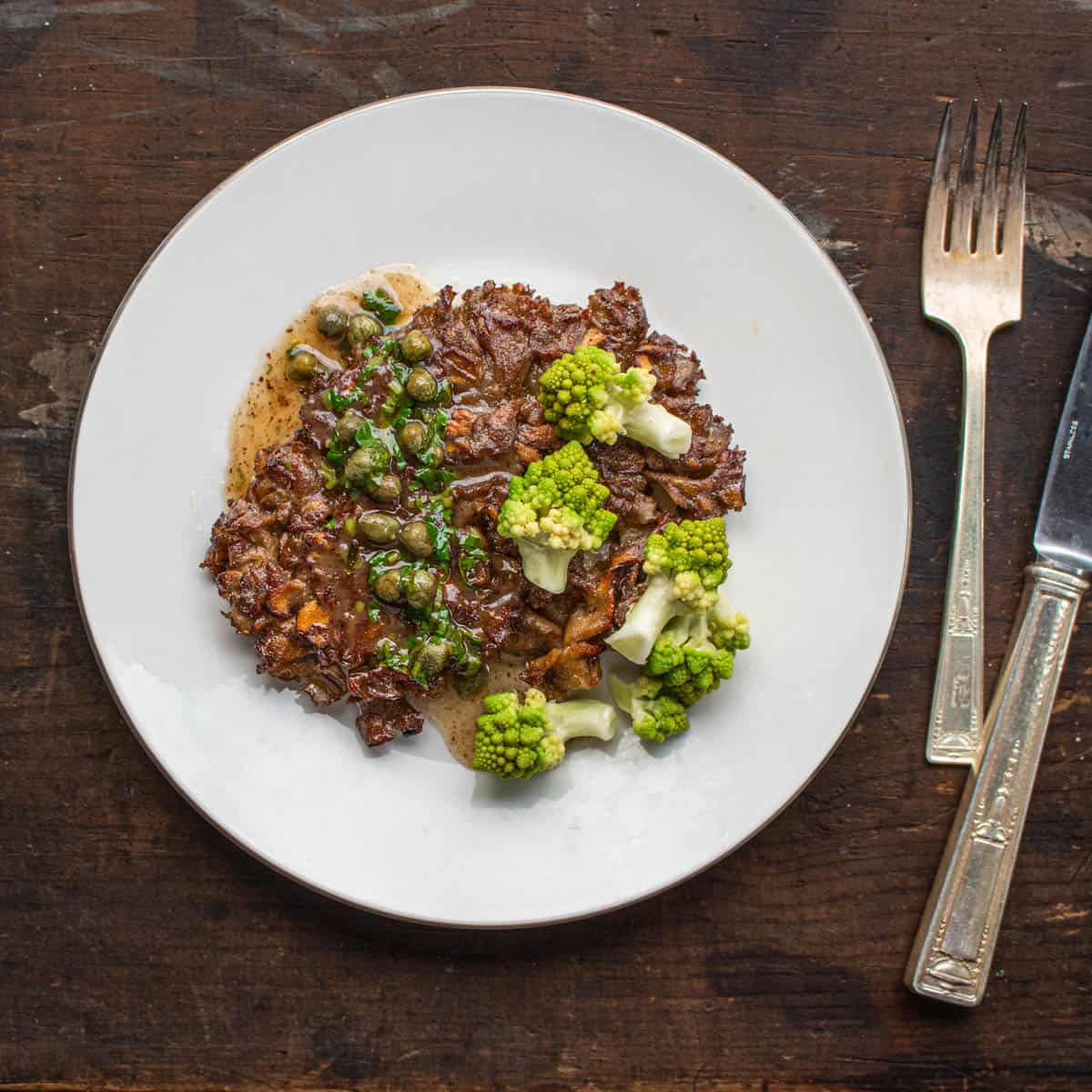 Cauliflower mushroom steak recipe with caper pan sauce and romanesco