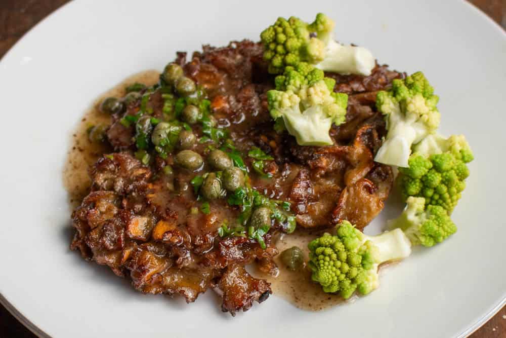 Cauliflower mushroom steak recipe with caper pan sauce and romanesco