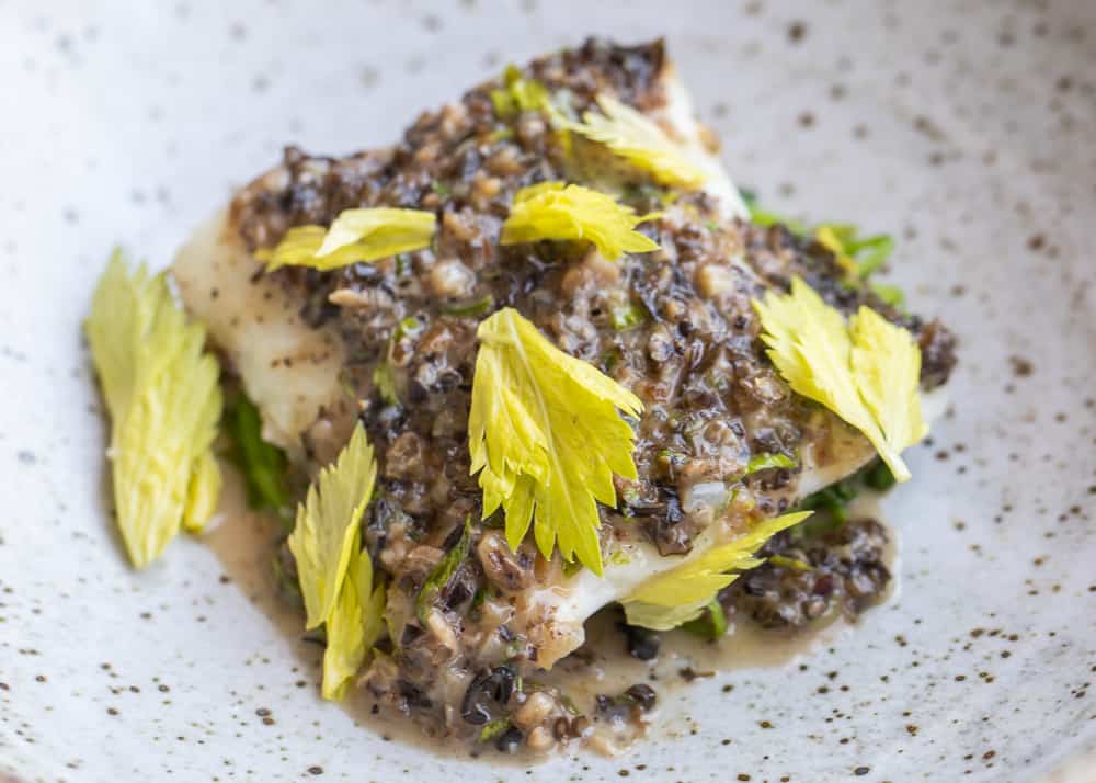 Cod with venison trotter-mushroom sauce and celery leaf