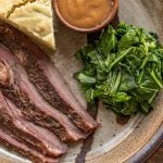 Smoked venison brisket recipe with collard greens and wild plum sauce