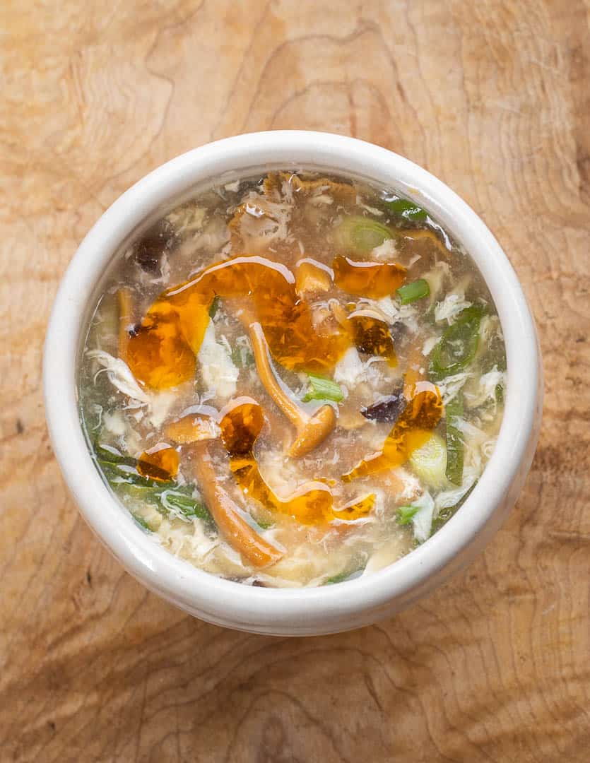 Hot and sour soup with wood ear and yellowfoot mushrooms 