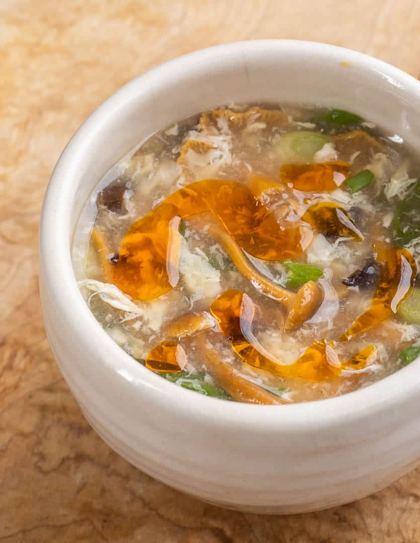 Hot and sour soup with wood ear and yellowfoot mushrooms