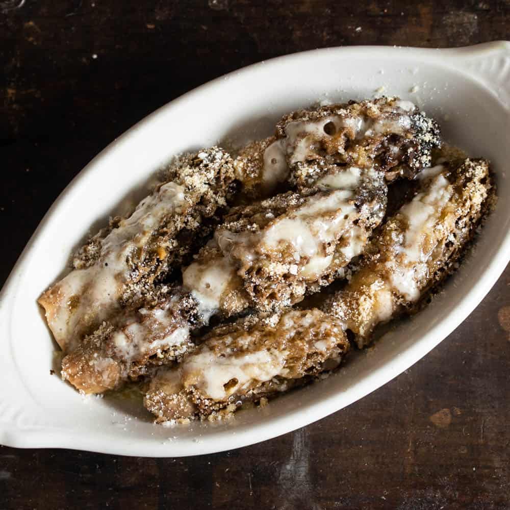 Crab Stuffed Dried Morel Mushrooms in a baking dish. 