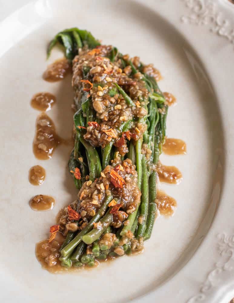 Edible goldenrod shoots with sunflower gomae sauce