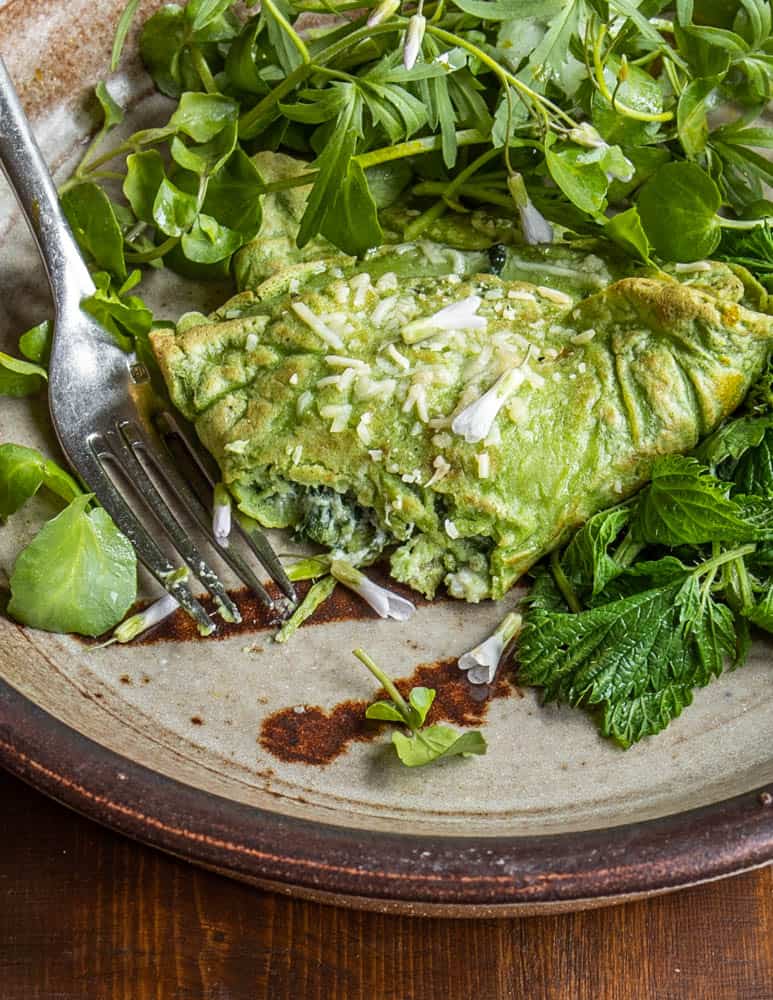 Nettle crespelle with steamed nettles and a foraged greens salad