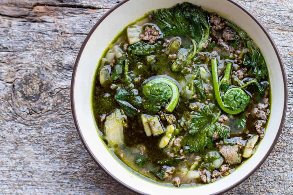 green vegetable soup in a bowl