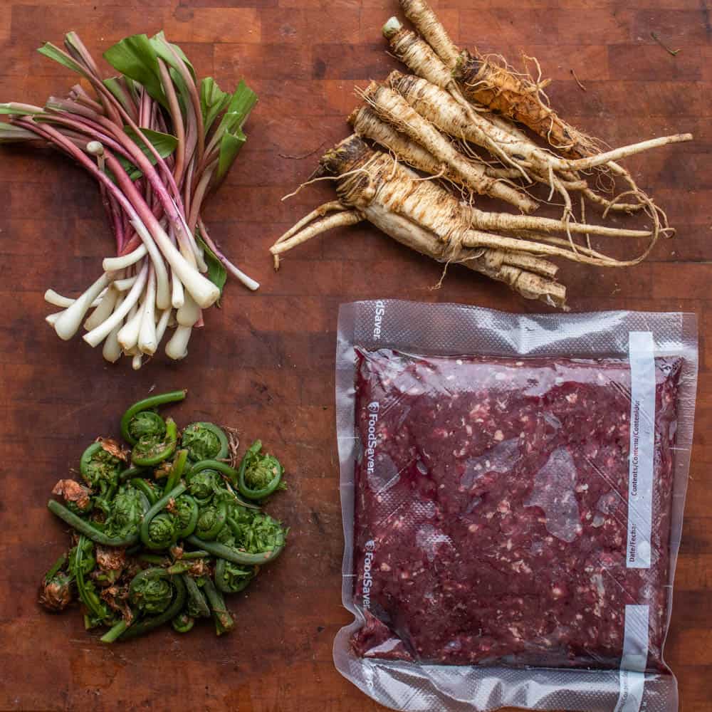 wild parsnips, ground venison, fiddlehead ferns and ramps 