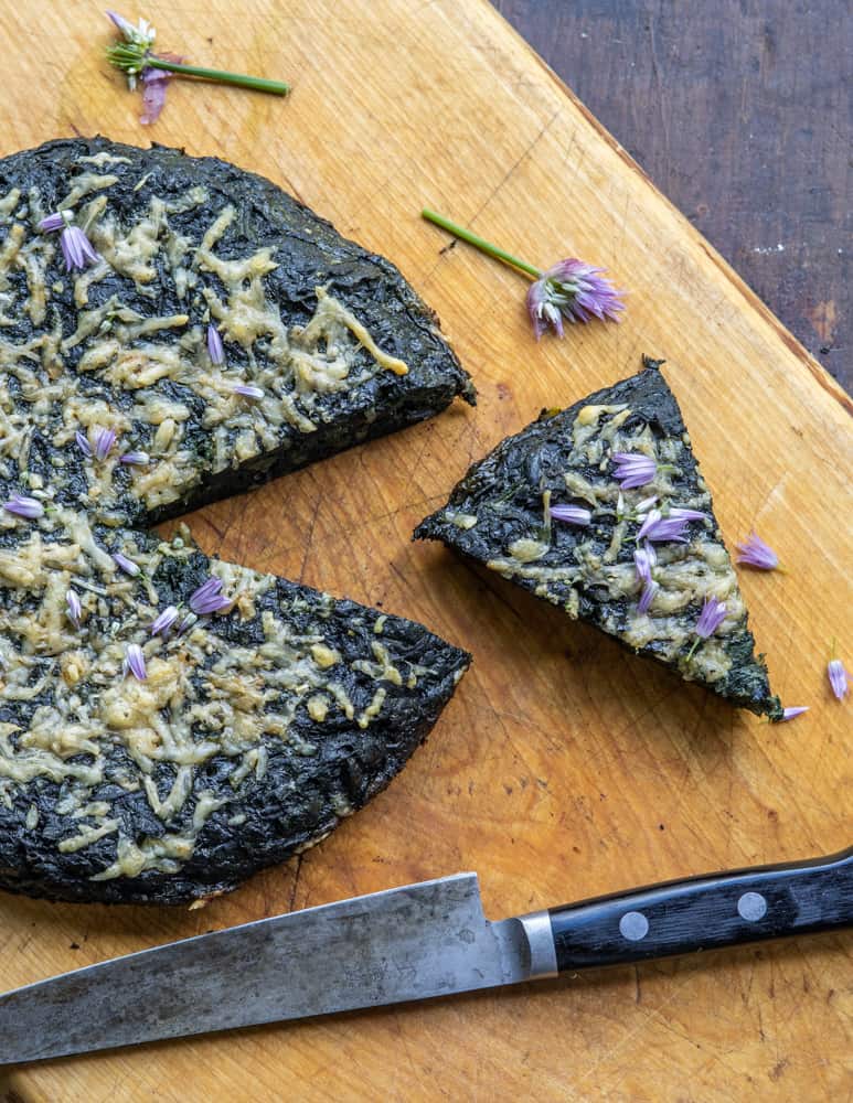Stinging nettle frittata with parmesan and chive flowers