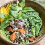 Wild rice bowl with roasted carrots, herbs, sunflower seeds, chickweed, salsa and silphium meristems