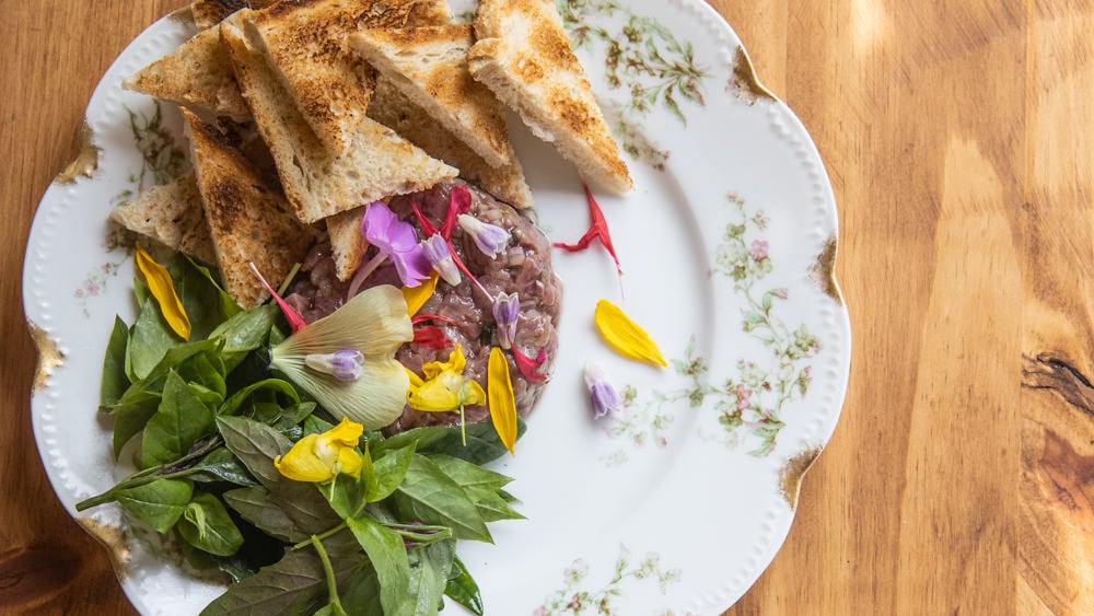 Lamb tartare with green coriander vinaigrette