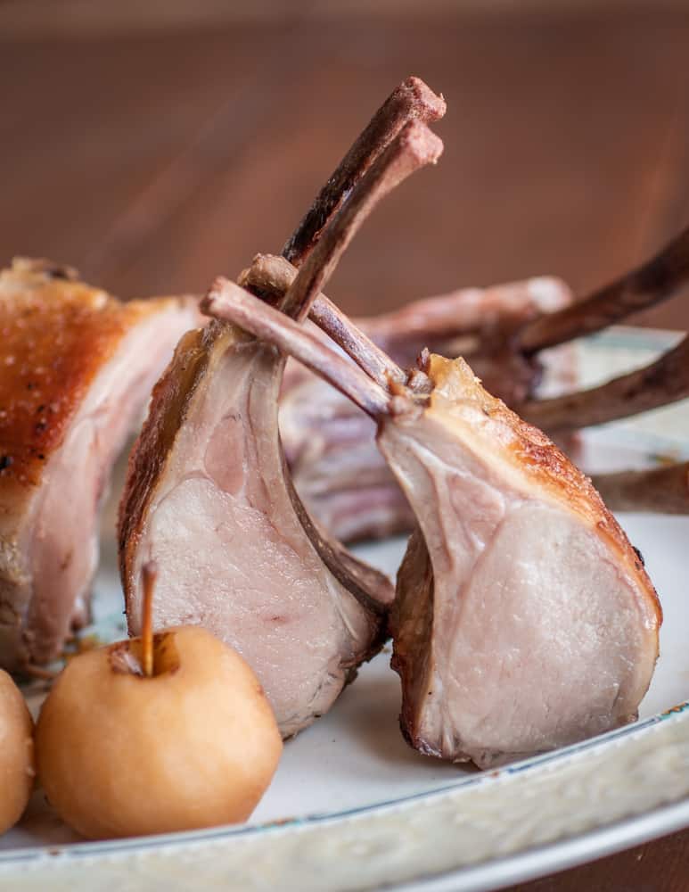 Rack of suckling pig with chestnut crabapples and roasted brussels sprouts