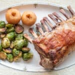 Rack of suckling pig with chestnut crabapples and roasted brussels sprouts