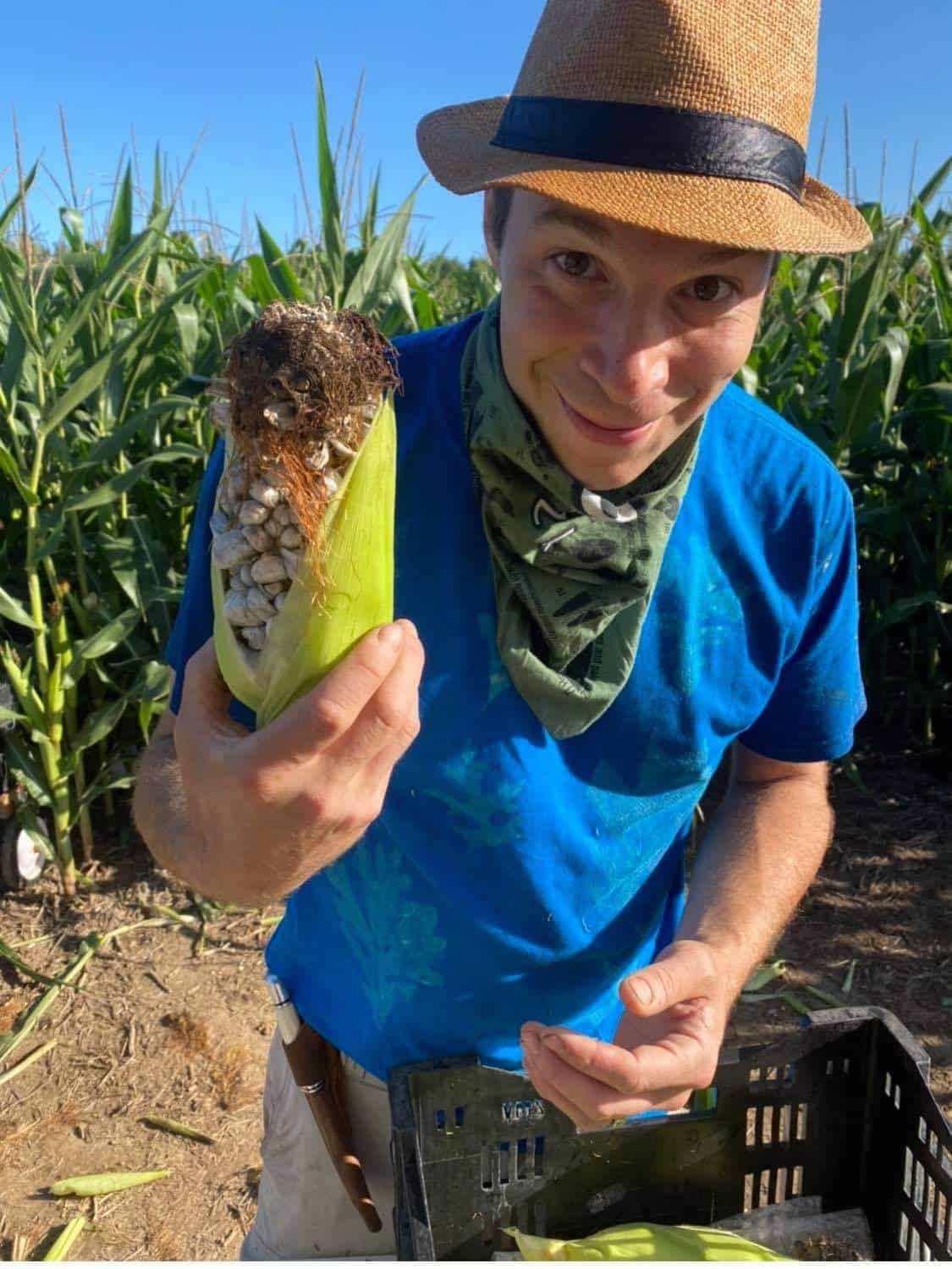 Chef Alan Bergo with an ear of huitlacoche