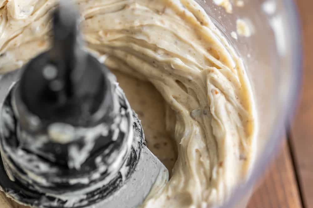 Pureeing candy cap compound butter in a food processor