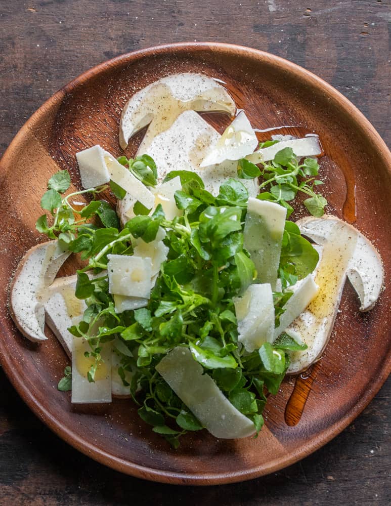 Raw porcini mushroom salad with chickweed, watercress and parmesan