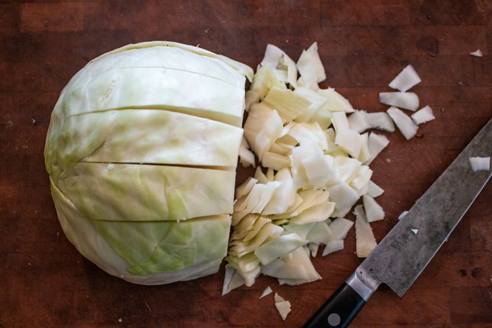 Cutting green cabbage