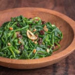 Italian foraged greens cooked with pine nuts and raisins
