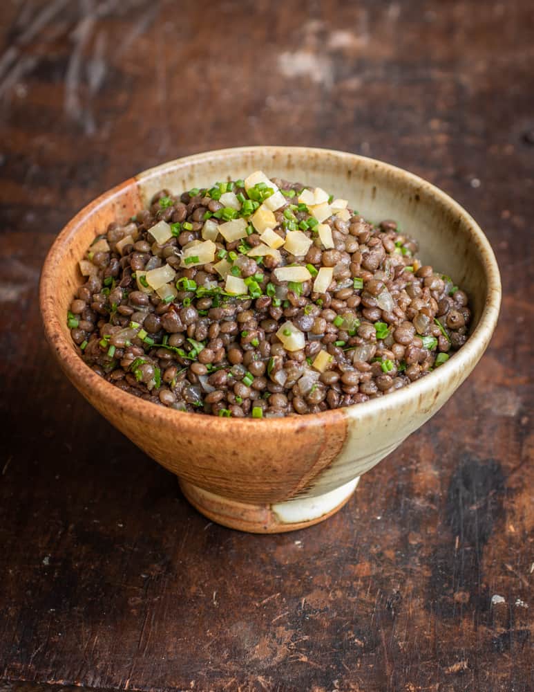 Black lentils with golpar or cow parsnip seed