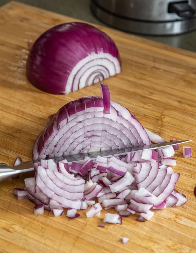 Finely dicing a red onion