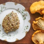 wild Mushroom Pudding with chanterelles near the plate
