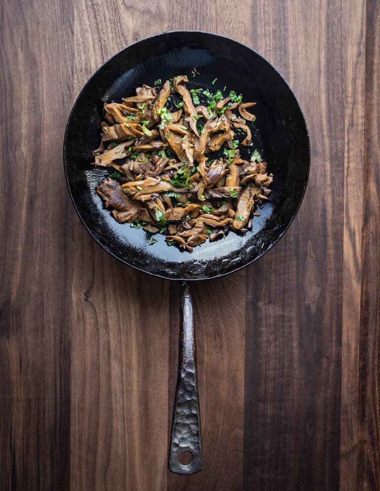 Hen of the woods mushroom barbacoa in a carbon pan