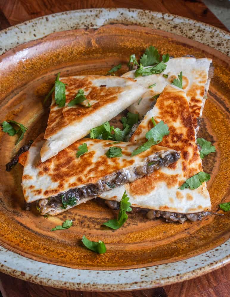 Quesadilla de huitlacoche on a ceramic plate