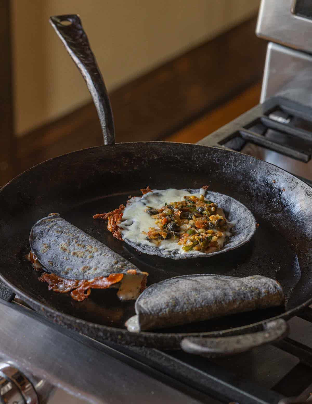 Cooking huitlacoche quesadillas in a Kehoe carbon steel pan.