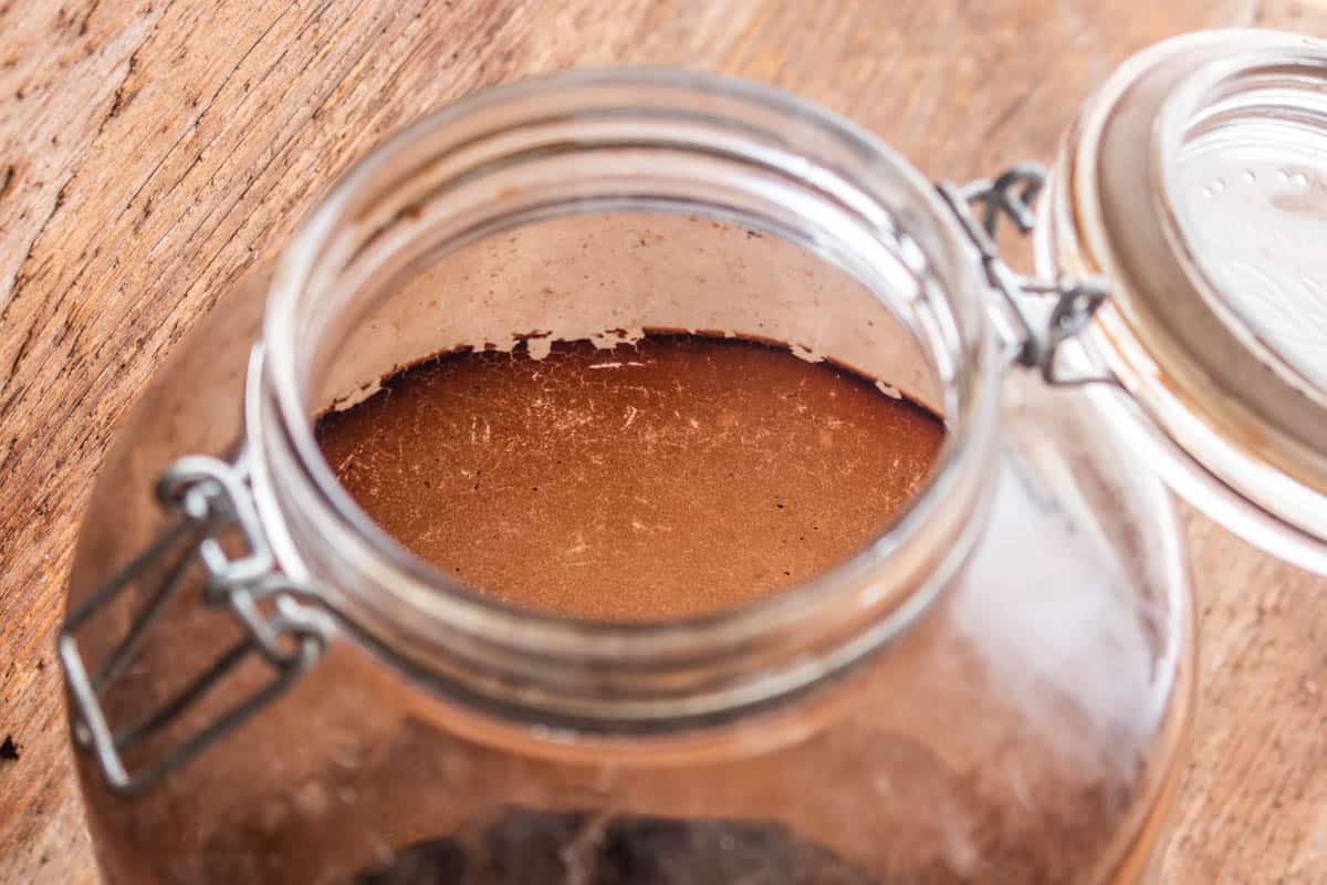 Vin de Noix or Walnut Wine Stains in a jar