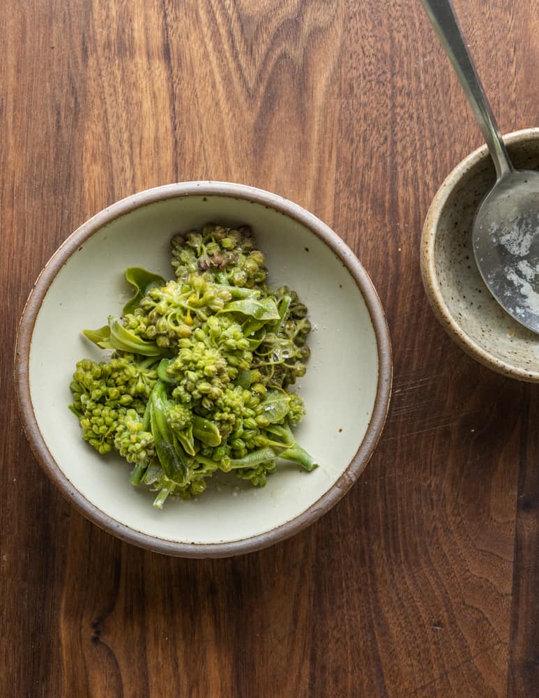 Steamed milkweed buds with butter and lemon