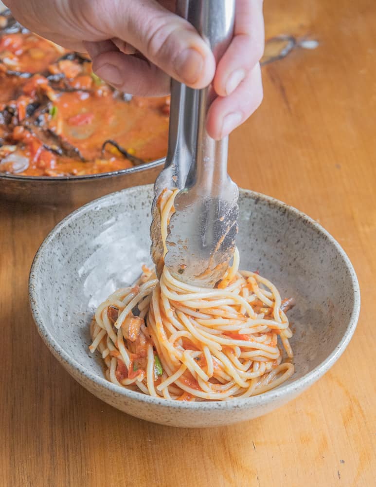 plating pasta by twirling the noodles