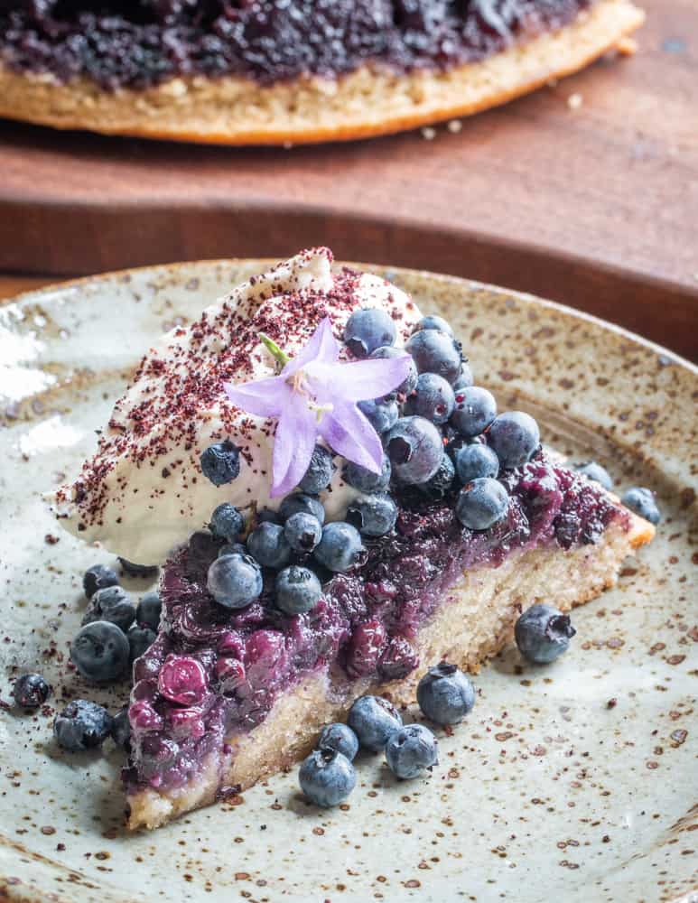 Wild blueberry-hazelnut upside down cake with meadowsweet cream