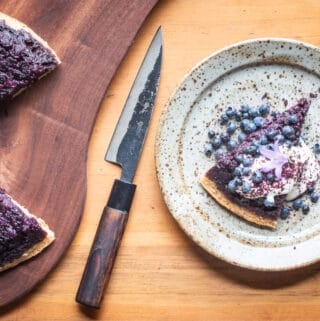 Wild blueberry-hazelnut upside down cake with meadowsweet cream