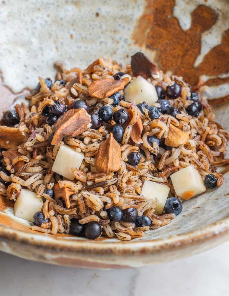 Parched wild rice cooked in hickory nut milk with butternuts