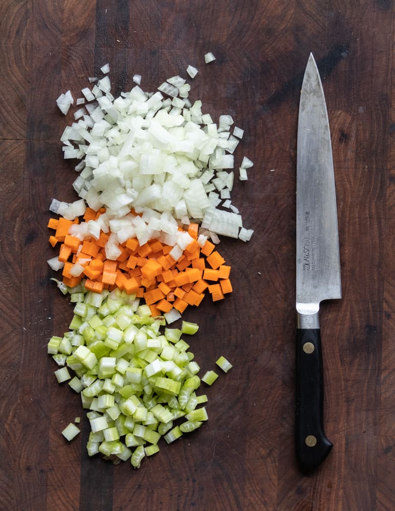 Cutting mirepoix for soup into small dice