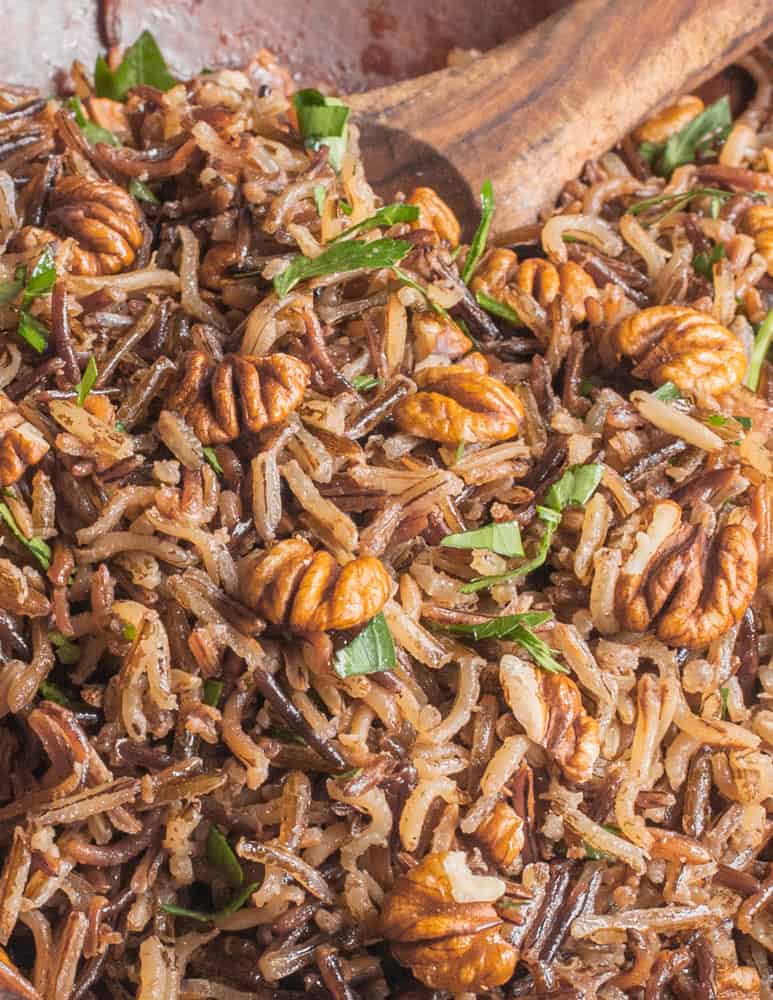 Parched wild rice cooked in hickory nut milk with hickory nuts