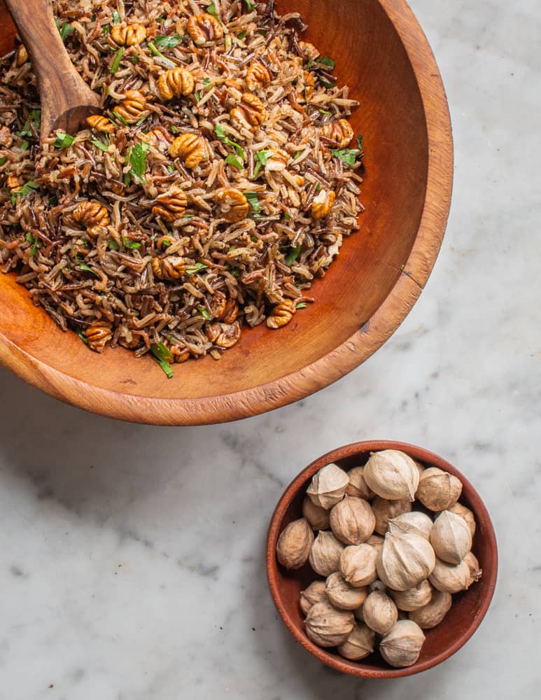 Parched wild rice cooked in hickory nut milk with hickory nuts