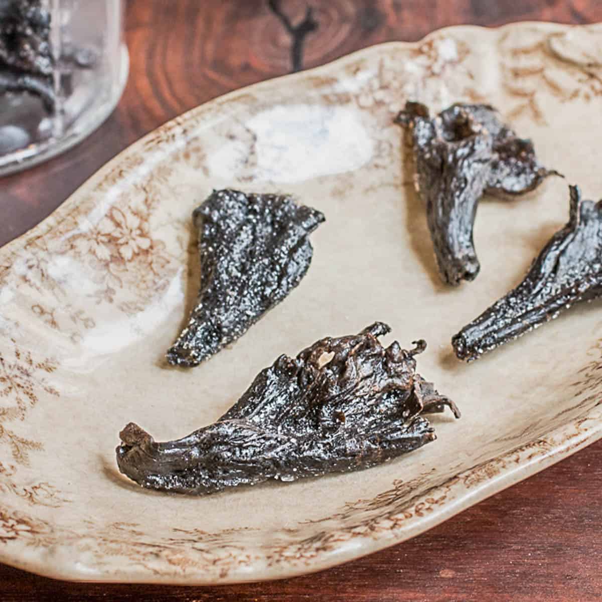 candied black trumpet mushrooms on a dish 