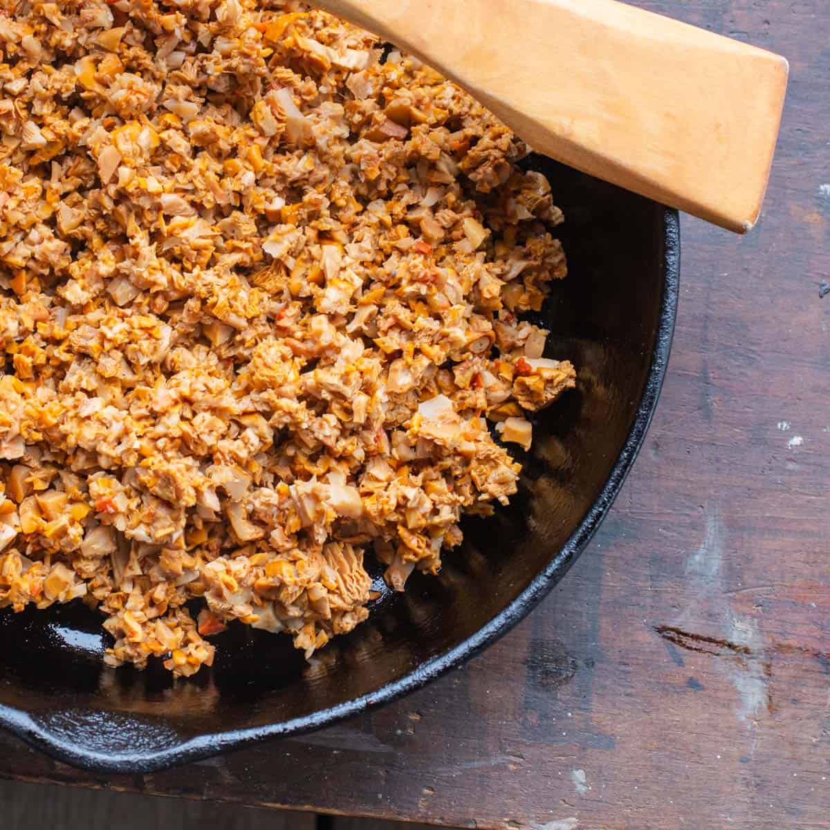 hedgehog mushroom duxelles in a cast iron pan.