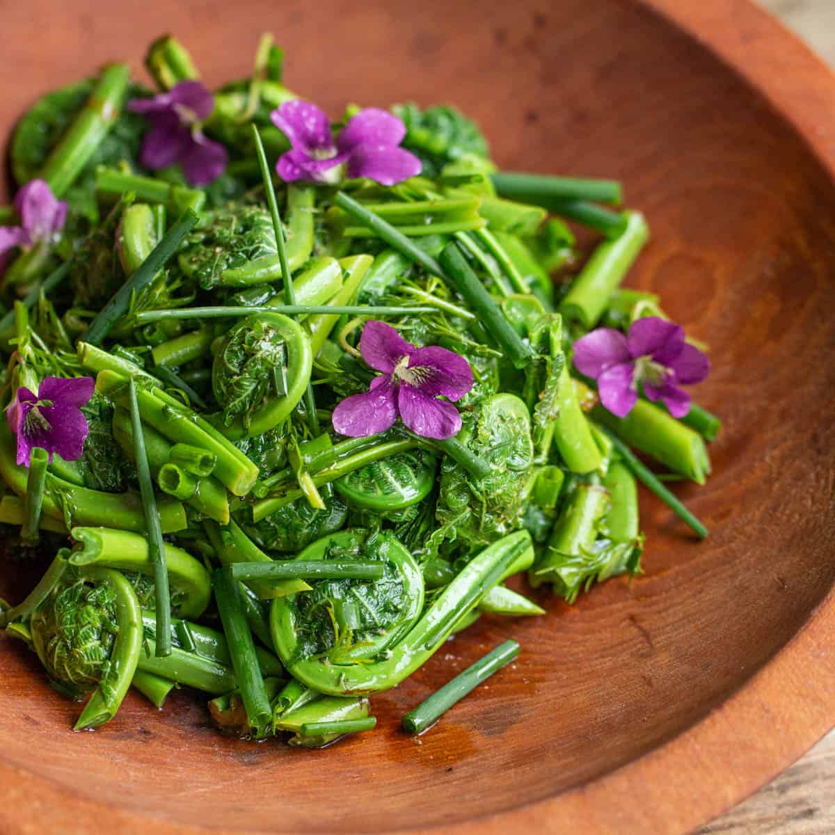 fiddlehead salad in a bowl 