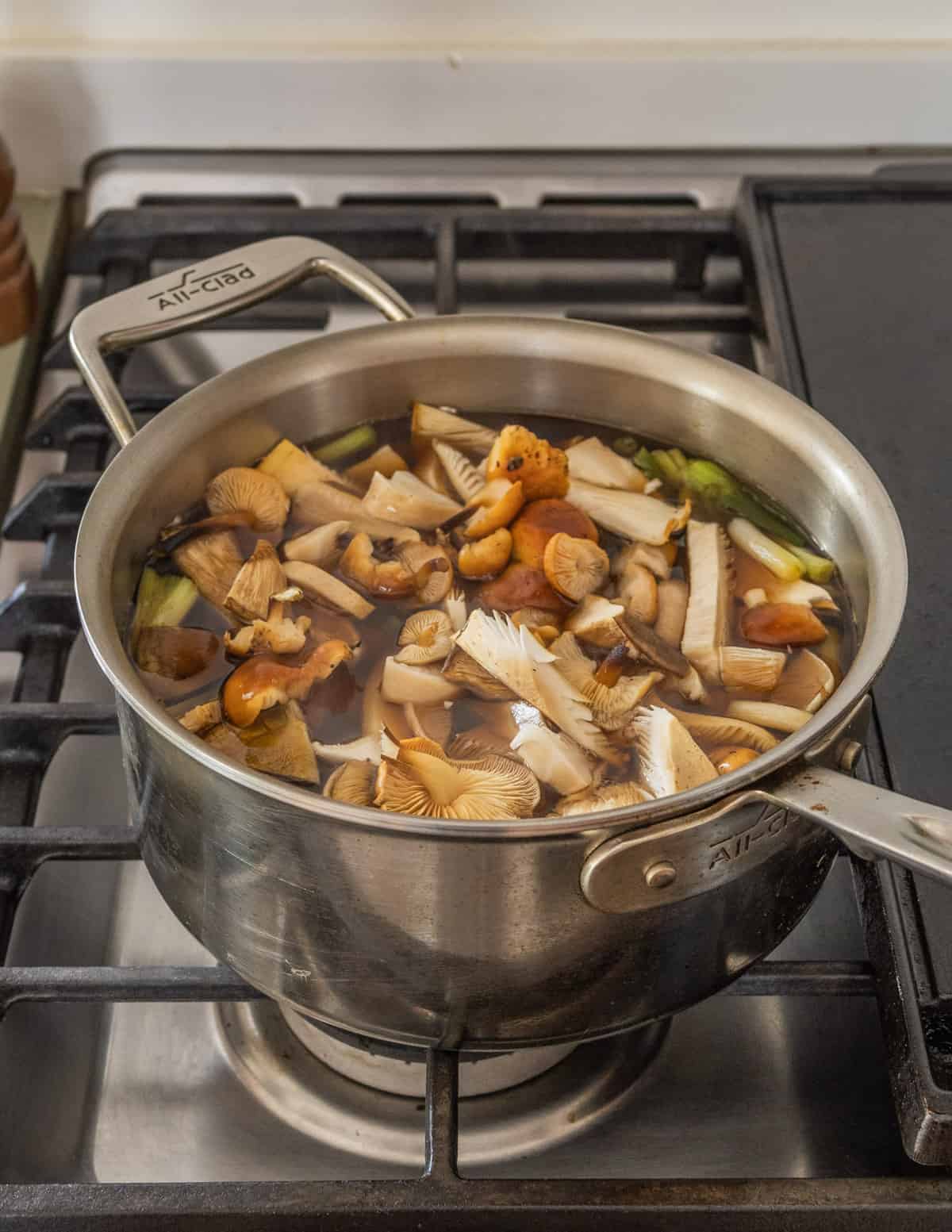 cooking wild mushrooms in broth