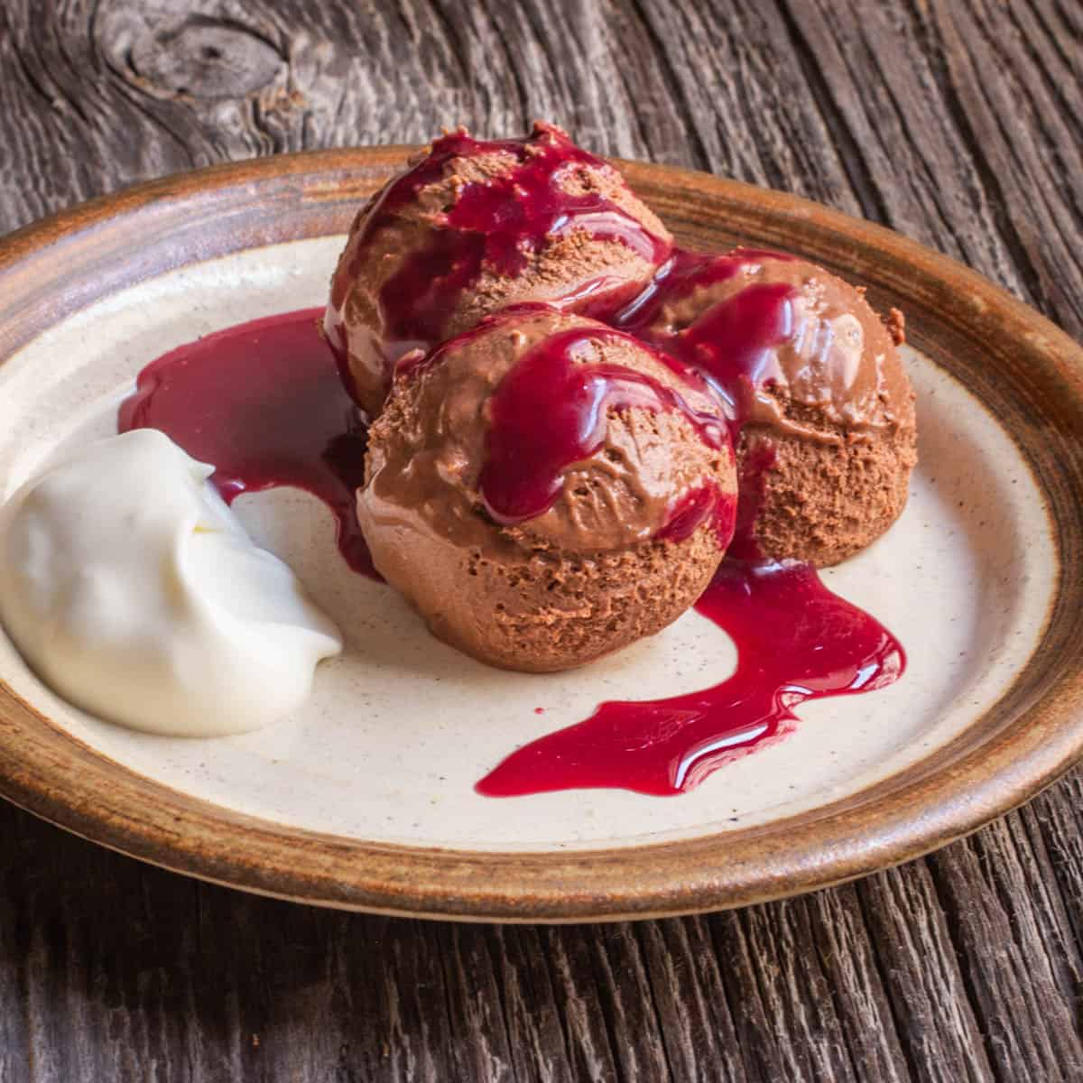 scoops of chocolate mousse on a plate 