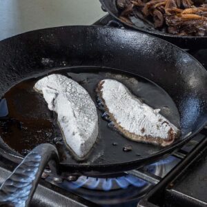 frying veal liver in a pan