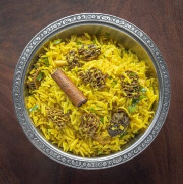 indian mushroom rice in a metal bowl