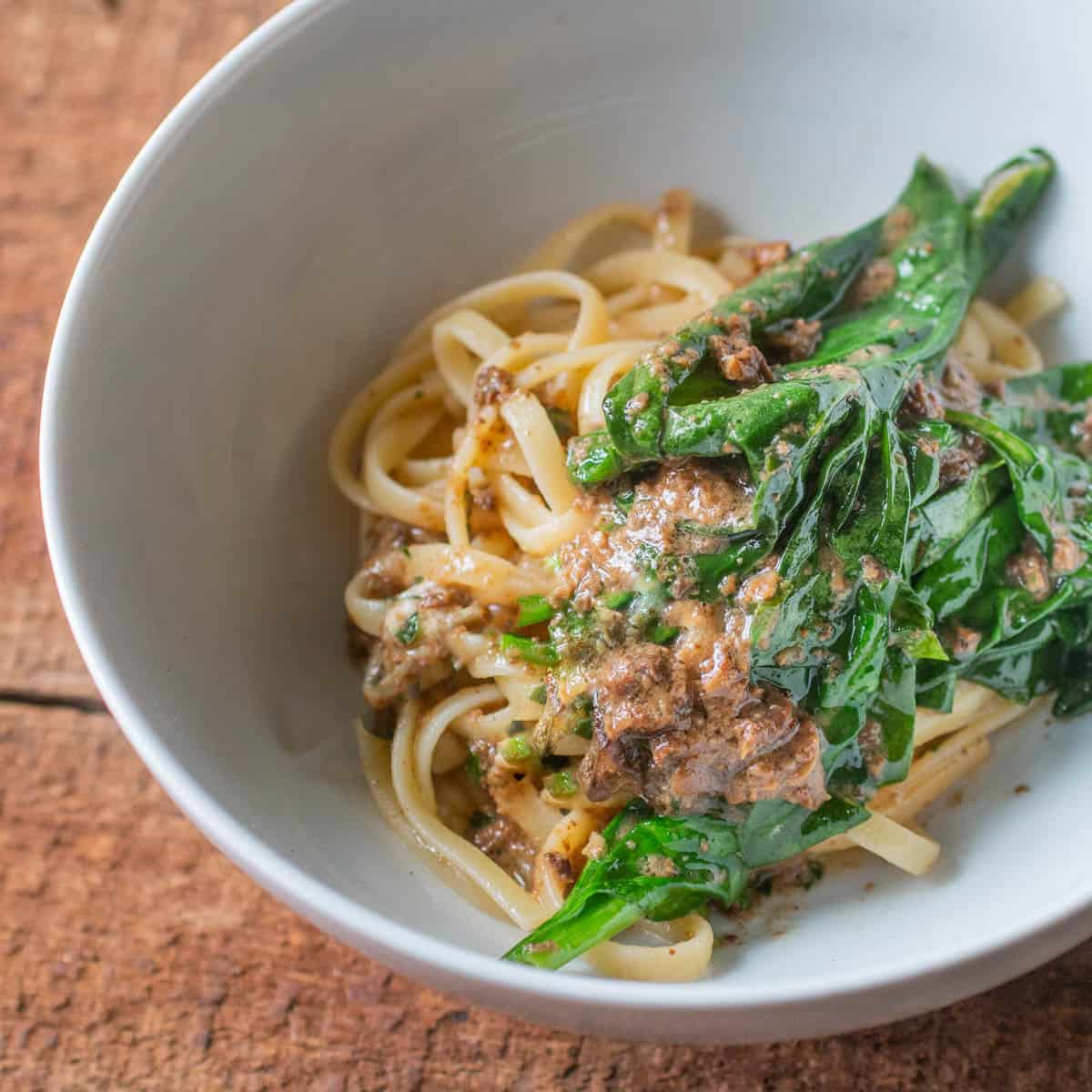 pasta with mushroom butter sauce and spinach