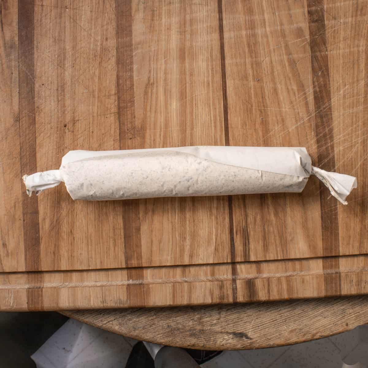 rolling mushroom butter in parchment